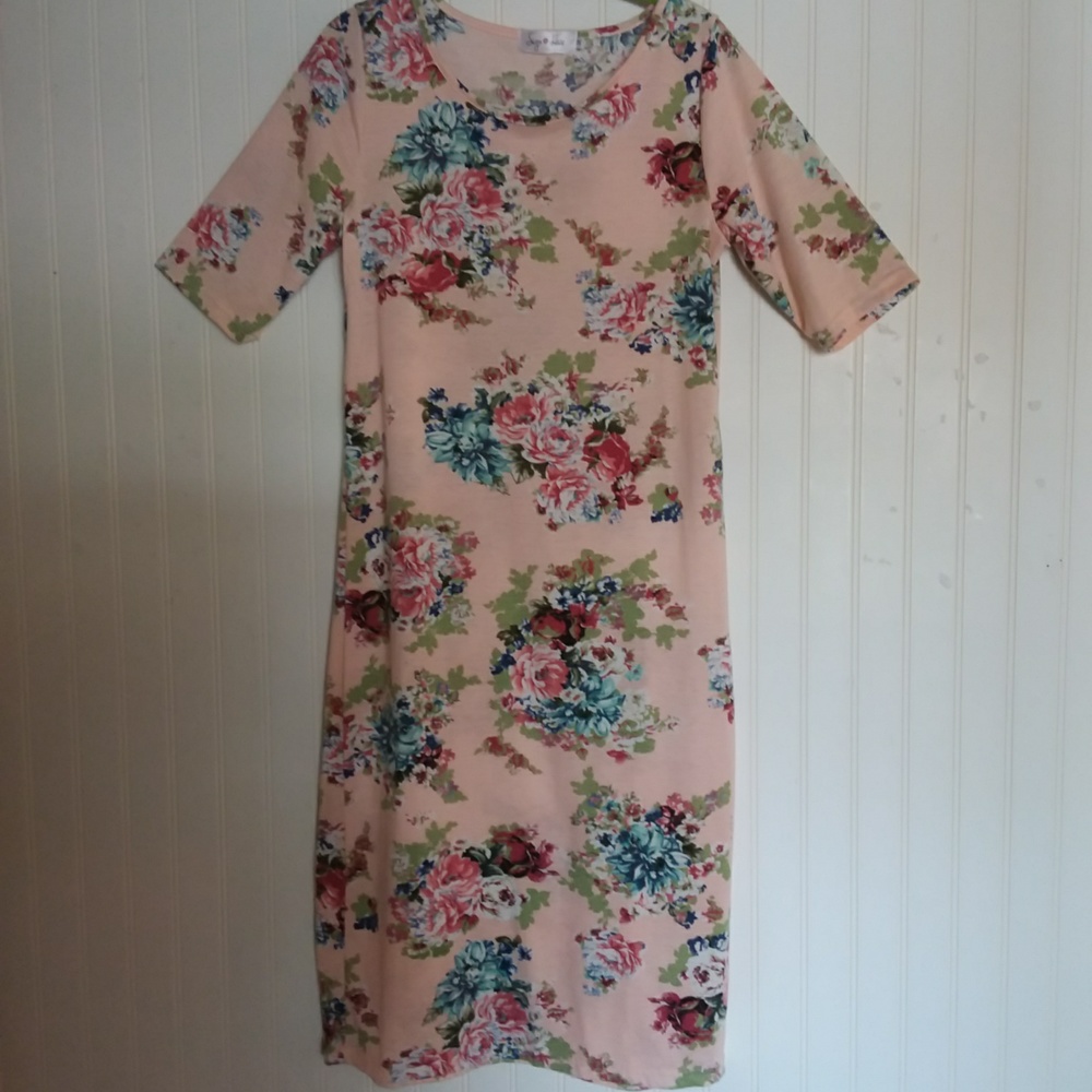 SIGN HERE dress in size medium.